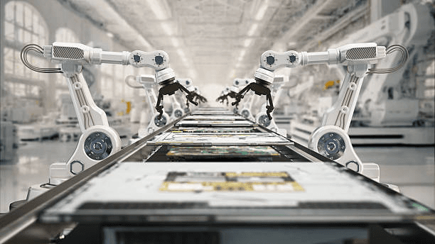 Robotic arms working on an assembly line